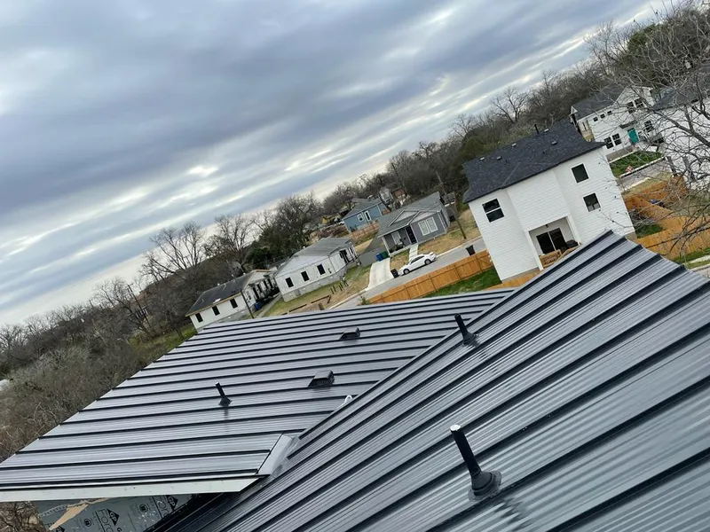 Standing seam metal roof panels with vents for Skylight Repair in Hudson